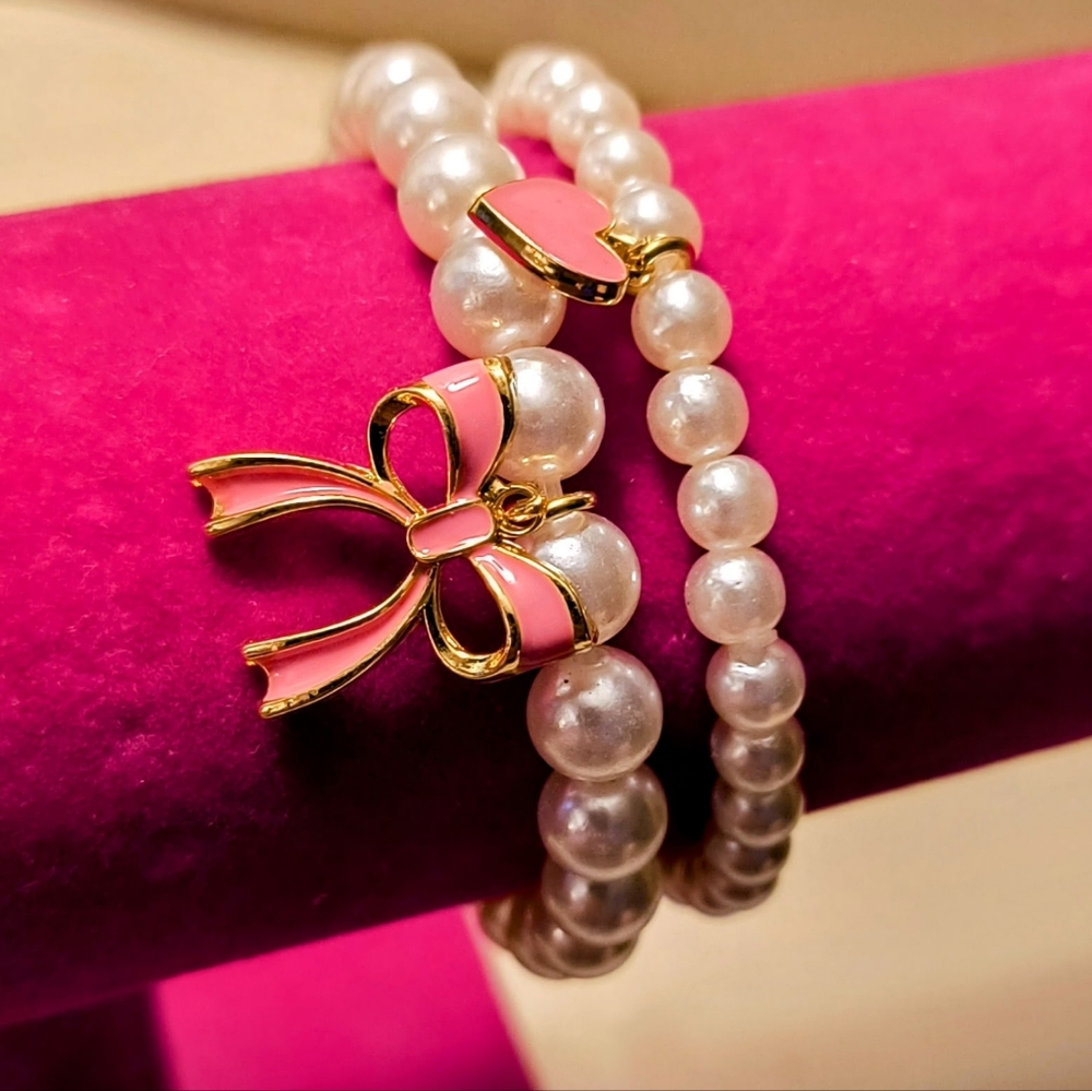 Elegant VIVIENNE WESTWOOD Pink and Gold Bow Pearl Bracelet